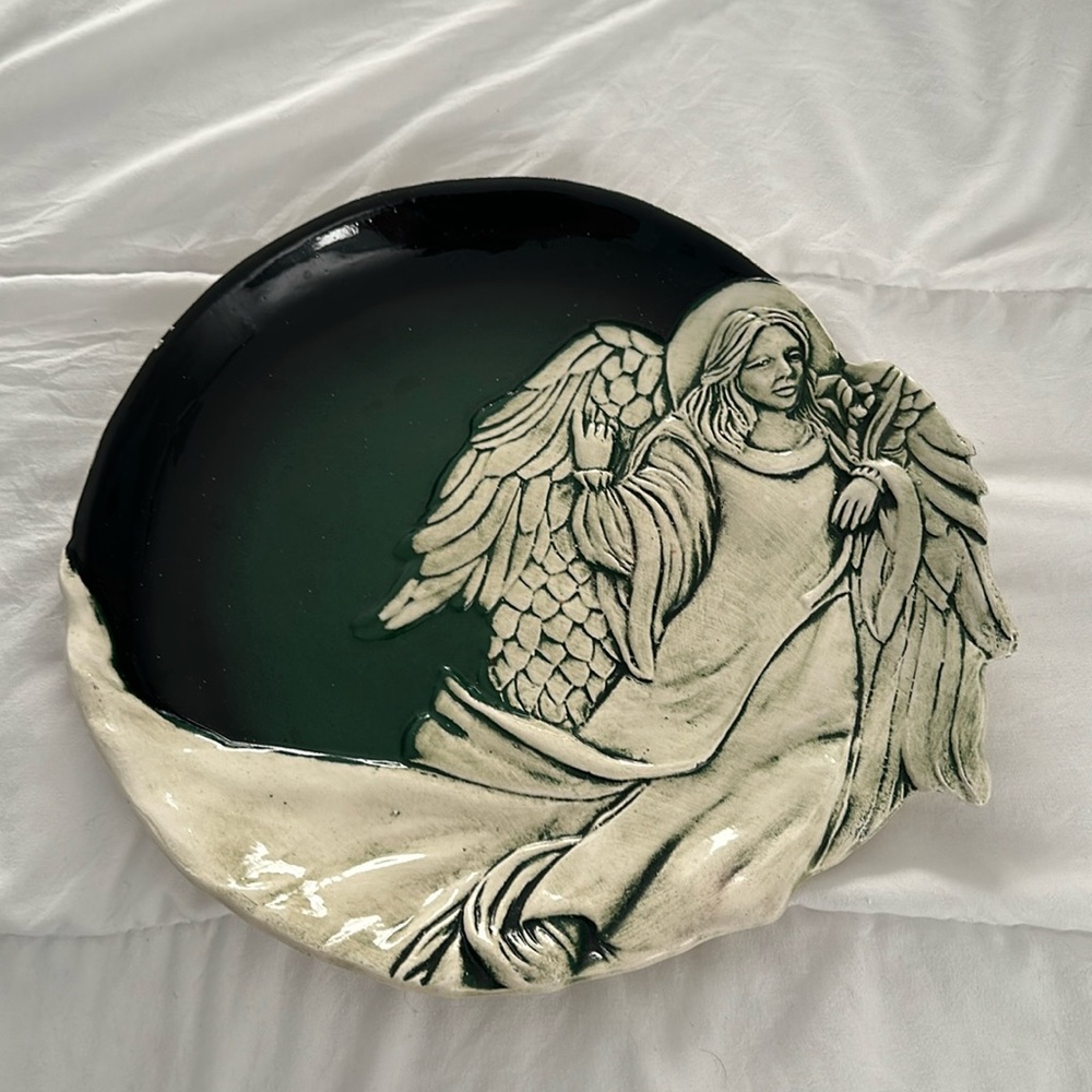 Vintage Flat Earth holiday angel ceramic pottery plate.